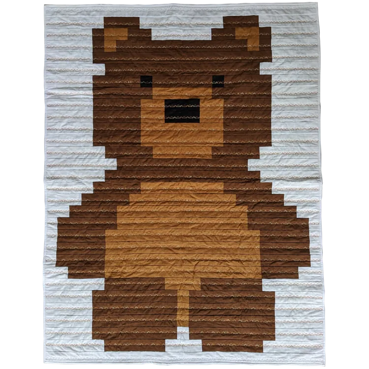 Kinderquilt mit Teddybär-Motiv in Brauntönen auf Baumwolle